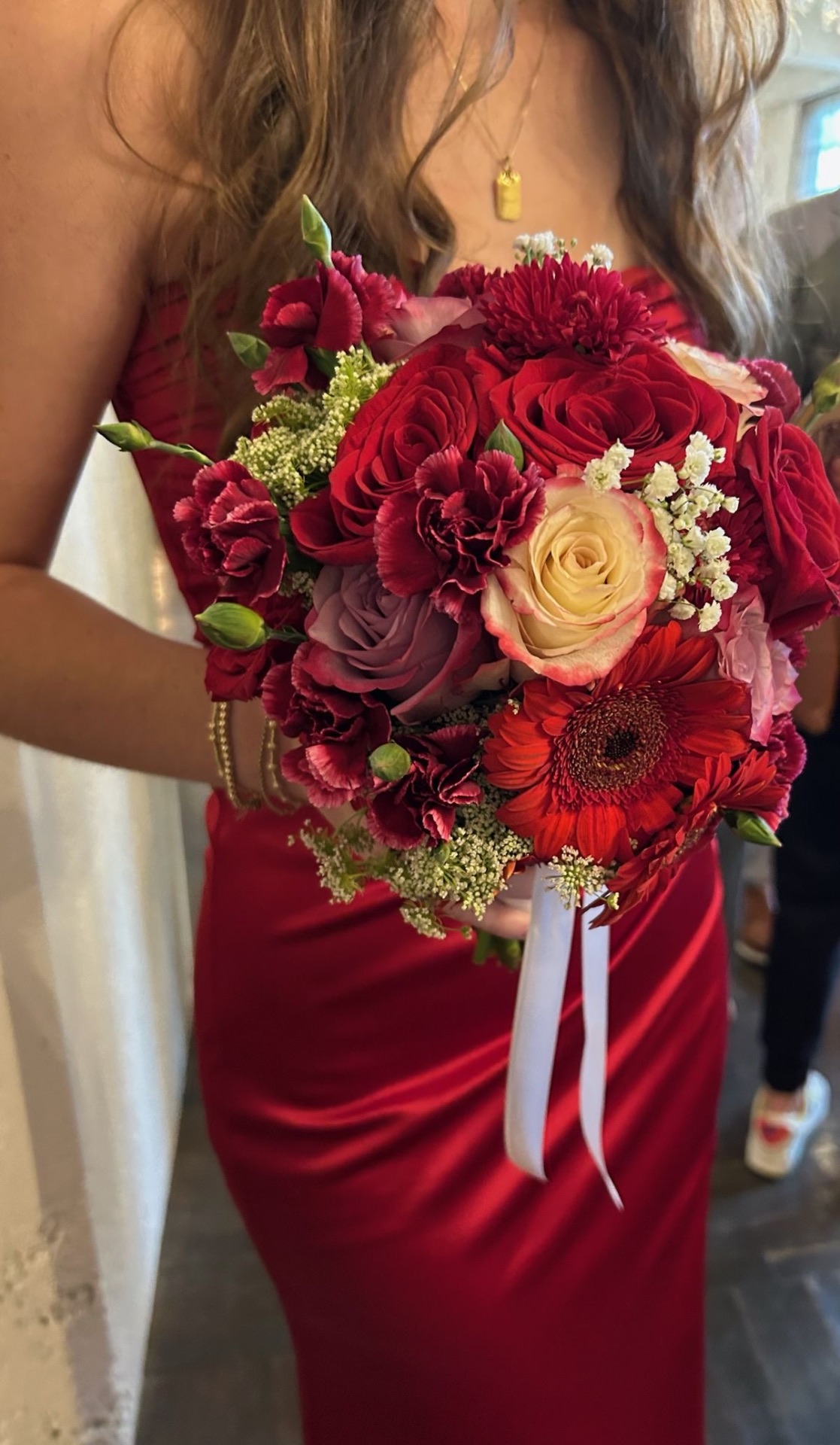 Red rose bridesmaid bouquet with lavender accent