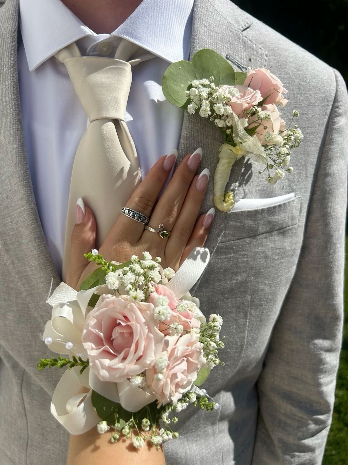 Blush rose corsage and matching boutonniere
