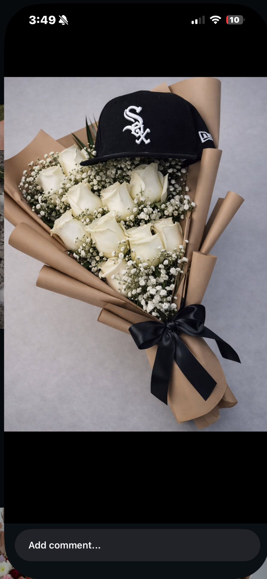 White rose bouquet with White Sox cap