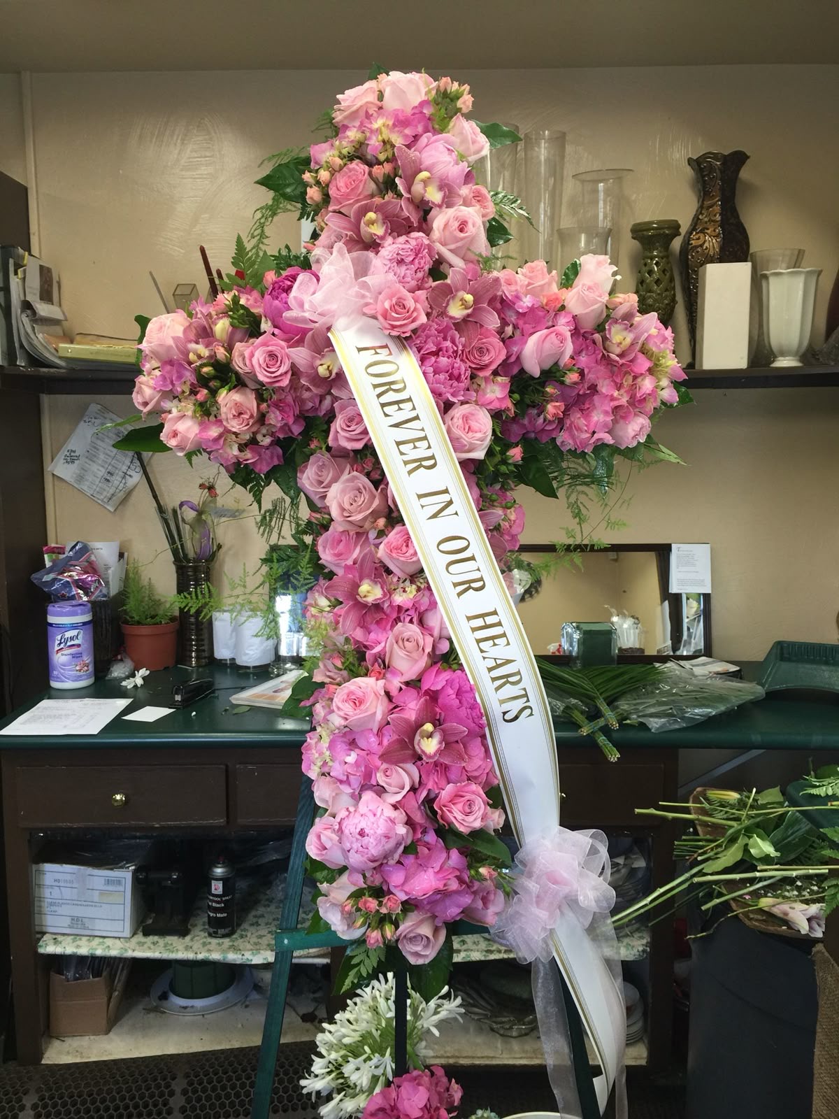 Pink rose funeral cross — Forever In Our Hearts
